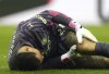 CORRECTS TO MANCHESTER CITY Manchester City goalkeeper Ederson reacts to an injury, during the English Premier League soccer match between Newcastle United and Manchester City at St. James' Park, in Newcastle upon Tyne, England, Saturday, Jan. 13, 2024. (Owen Humphreys/PA via AP)