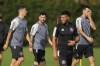 Inter Miami forward Luis Suarez, left, walks with forward Lionel Messi, center, and defender Sergio Busquets, right, during a training session for the MLS soccer team, Saturday, Jan. 13, 2024, in Fort Lauderdale, Fla. (AP Photo/Rebecca Blackwell)