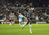 Newcastle United's Alexander Isak celebrates scoring their side's first goal of the game, during the English Premier League soccer match between Newcastle United and Manchester City, at St. James' Park, in Newcastle upon Tyne, England, Saturday, Jan. 13, 2024. (Owen Humphreys/PA via AP)