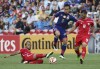 FILE - Palestine's Musab Battat, right, and Ismail Alamour compete for the ball with Japan's Yuto Nagatomo, center, during the AFC Asia Cup soccer match between Japan and Palestine in Newcastle, Australia, Monday, January 12, 2014. (AP Photo/Rob Griffith, File)