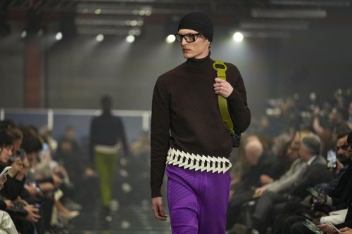 A model wears a creation part of the men's Prada Fall-Winter 2024-2025 collection, that was presented in Milan, Italy, Sunday, Jan. 14, 2024. (AP Photo/Luca Bruno).