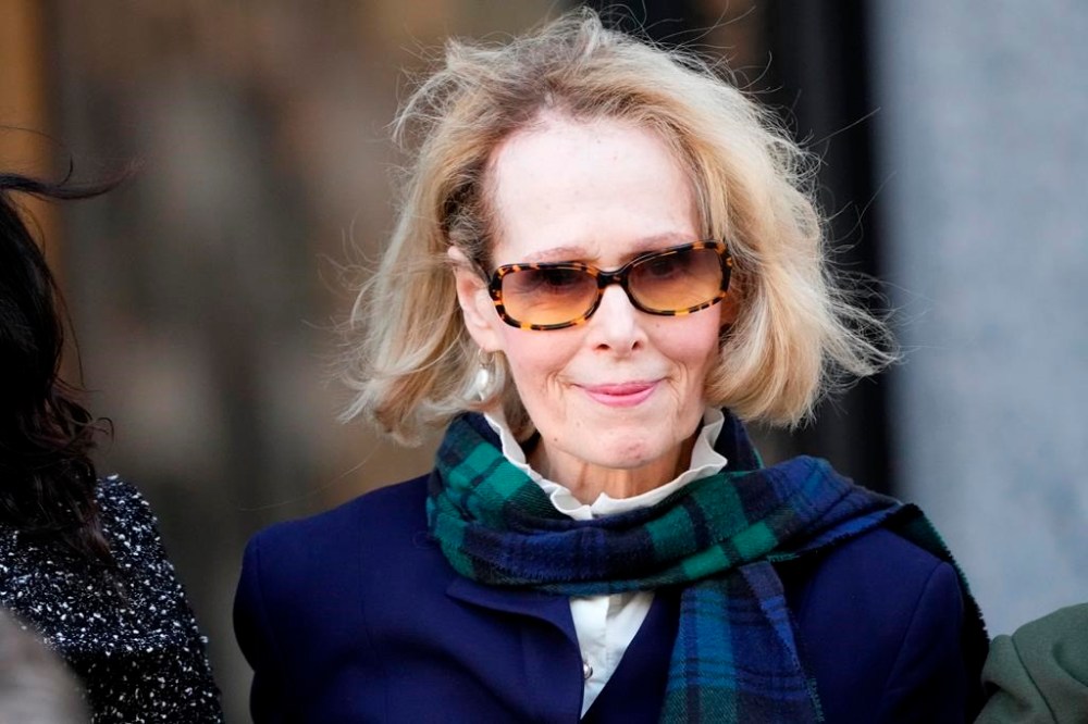 FILE - E. Jean Carroll leaves Manhattan federal court, Oct. 23, 2023, in New York. A federal judge said Sunday, Jan. 14, 2024, that former President Donald Trump can wait a week to testify at a New York defamation trial where he could face millions of dollars in damages after a jury concluded that he sexually abused columnist Carroll in the 1990s. (AP Photo/Frank Franklin II, File)