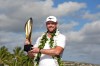 Grayson Murray holds the trophy after winning the Sony Open golf event, Sunday, Jan. 14, 2024, at Waialae Country Club in Honolulu. (AP Photo/Matt York)