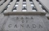A Bank of Canada survey finds Canadians are increasingly cutting back on spending while mortgage holders remain confident they can keep up with higher payments when their contracts renew. A Bank of Canada sign is seen in Ottawa, Monday, May 25, 2020. THE CANADIAN PRESS/Adrian Wyld