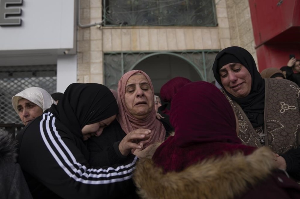 Five members of Parliament are in the Middle East to hear from Palestinians living outside of the Gaza Strip about how Canada can best help them. Palestinian women cry after taking the last look at the body of Suleiman Kanan, 17, during his funeral in the West Bank town of Bir Zeit, Monday, Jan. 15, 2024. THE CANADIAN PRESS/AP/Nasser Nasser
