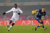 Verona's Josh Doig, right, and Empoli's Emmanuel Gyasi in action during the Serie A soccer match between Empoli FC and Hellas Verona at Marc Antonio Bentegodi stadium in Verona, Italy, Saturday Jan. 13, 2024. (Paola Garbuio/LaPresse via AP)