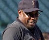FILE - San Francisco Giants manager Dusty Baker attends baseball practice at Pac Bell Park in San Francisco, Oct. 11, 2002. Baker is returning to the Giants for a third stint with the team, this time as a special assistant in the front office, according to a person with direct knowledge of the hiring. The person spoke on condition of anonymity because Baker's new position with the club had not been formally announced. (AP Photo/Elaine Thompson, File)
