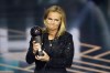 England's coach Sarina Wiegman accepts the Best Women's Coach award during the FIFA Football Awards 2023 at the Eventim Apollo in Hammersmith, London, Monday, Jan. 15, 2024. (AP Photo/Kirsty Wigglesworth)