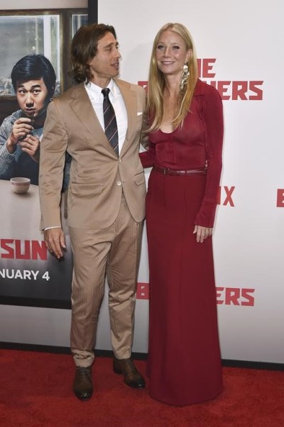 Brad Falchuk, left, and Gwyneth Paltrow arrive at the premiere of 