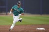 FILE - Seattle Mariners' Cooper Hummel runs the bases after hitting a solo home run during the third inning of a spring training baseball game against the Milwaukee Brewers, Monday, March 20, 2023, in Peoria, Ariz. Outfielder Cooper Hummel was traded from the New York Mets to the San Francisco Giants on Tuesday, Jan. 16, 2024 for cash.(AP Photo/Abbie Parr, File)