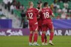 Lebanon players greet each other at the end of the Asian Cup Group A soccer match between China and Lebanon at Al Thumama Stadium in Doha, Qatar, Wednesday, Jan. 17, 2024. (AP Photo/Thanassis Stavrakis)