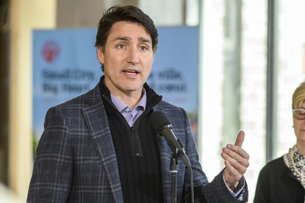 Prime Minister Justin Trudeau is set to arrive in Nunavut today to participate in a ceremony about transferring responsibilities for public lands and resources to the territory from the federal government. Trudeau talks to media during a visit to The Wellington, a new inclusive housing project in Saint John, N.B., Wednesday, Jan. 17, 2024. THE CANADIAN PRESS/Michael Hawkins