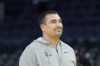 Golden State Warriors assistant coach Dejan Milojevic watches players warm up before an NBA preseason basketball game against the Denver Nuggets in San Francisco, Friday, Oct. 14, 2022. Warriors assistant coach Dejan Milojević, a mentor to two-time NBA MVP Nikola Jokic and a former star player in his native Serbia, died Wednesday, Jan. 17, 2024, after suffering a heart attack, the team announced. Milojević, part of the staff that helped the Warriors win the 2022 NBA championship, was 46. (AP Photo/Jeff Chiu)