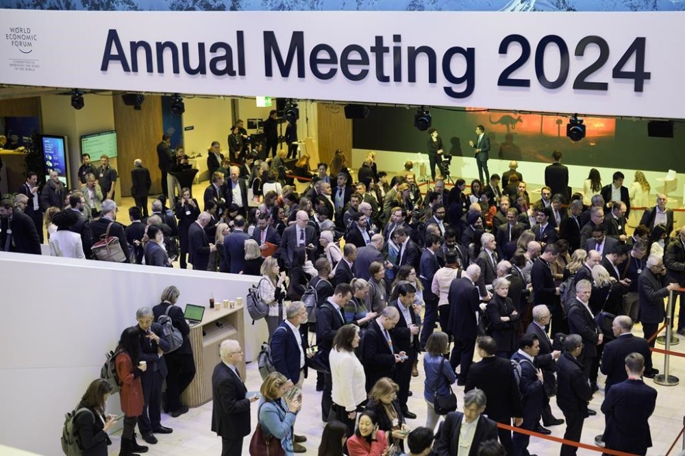 People line up to listen to the panel discussion