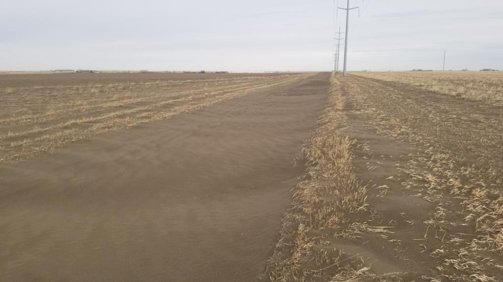 Blowing dirt fills in ditches and irrigation canals during a wind erosion event in Lethbridge County in Alberta in a 2022 handout photo. THE CANADIAN PRESS/HO-Farming Smarter **MANDATORY CREDIT** .