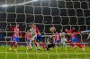 Atletico Madrid's goalkeeper Jan Oblak, center, fails to save a goal during the Copa del Rey round of 16 soccer match between Real Madrid and Atletico Madrid in Madrid, Spain, Thursday, Jan. 18, 2024. (AP Photo/Manu Fernandez)