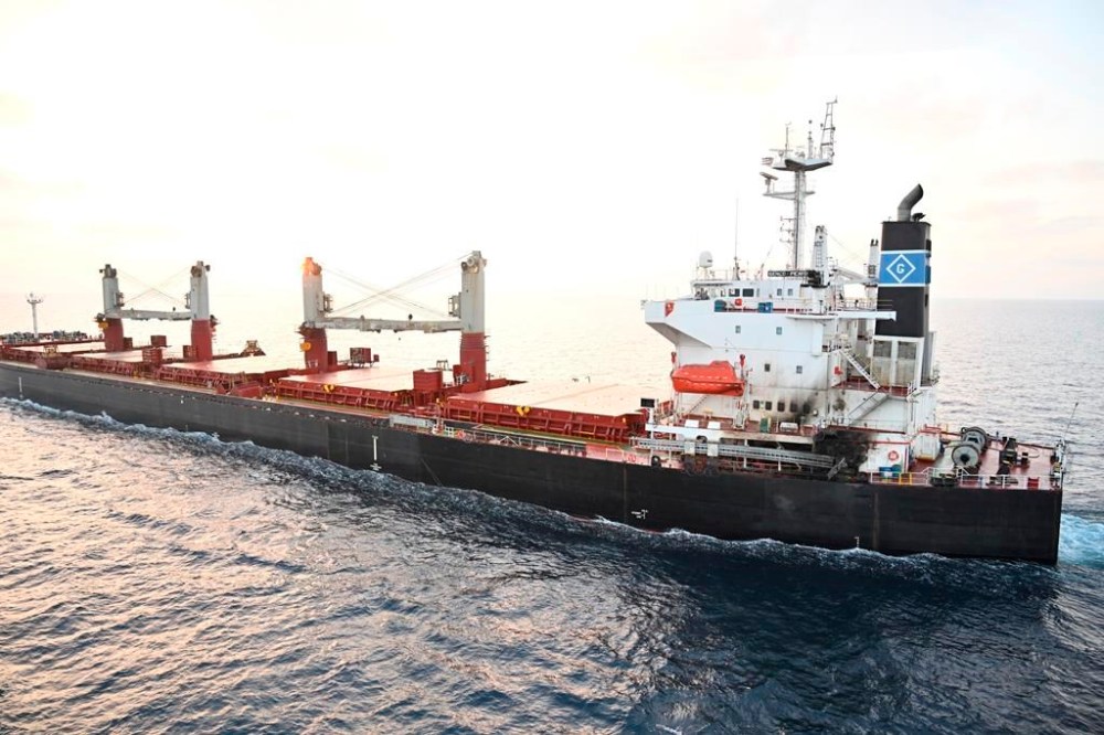 This photograph provided by the Indian Navy shows U.S.-owned ship Genco Picardy that came under attack Wednesday from a bomb-carrying drone launched by Yemen's Houthi rebels in the Gulf of Aden, Thursday, Jan.18, 2024. Indian Navy's Guided Missile Destroyer INS Visakhapatnam, deployed in in the Gulf of Aden for anti-piracy operations, responded to a distress call following the drone attack and intercepted Genco Picardy on Thursday to provide assistance, an Indian Navy statement said. (Indian Navy via AP)