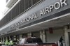 FILE - Vehicles pass the entrance to Miami International Airport in Miami Tuesday, May 12, 2020. A cargo plane made an emergency landing, Thursday Jan. 18, 2024, at Miami International Airport after experiencing engine failure shortly after takeoff, an airline spokesperson said. (AP Photo/Wilfredo Lee, File)