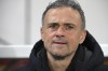PSG's head coach Luis Enrique waits for the start of the French League One soccer match between Lens and Paris Saint-Germain at the Bollaert-Delelis stadium in Lens, northern France, Sunday, Jan. 14, 2024. (AP Photo/ Matthieu Mirville)