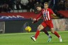 FILE - Atletico Madrid's Cesar Azpilicueta, right, and Barcelona's Robert Lewandowski challenge for the ball during the Spanish La Liga soccer match between Barcelona and Atletico Madrid at the Olimpic Lluis Companys stadium in Barcelona, Spain, on Dec. 3, 2023. Azpilicueta will be sidelined by a knee injury for an unspecified period, the Spanish club said on Friday, Jan. 19, 2024. (AP Photo/Joan Monfort, File)