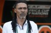 Cameroon's head coach Rigobert Song watches on as players sing the national anthems before the start of African Cup of Nations Group C soccer match between Senegal and Cameroon, at the Charles Konan Banny stadium in Yamoussoukro, Ivory Coast, Friday, Jan. 19, 2024. (AP Photo/Sunday Alamba)