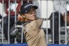 Lydia Ko, from New Zealand, watches tee shot on the first hole during the first round of the Hilton Grand Vacations Tournament of Champions LPGA golf tournament Thursday, Jan. 18, 2024, in Orlando, Fla. (AP Photo/Kevin Kolczynski)