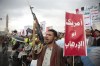 Houthi supporters attend a rally in support of the Palestinians in the Gaza Strip and against the U.S. government designating Houthis as a terror group in Sanaa, Yemen, Friday, 'Jan. 19, 2024. (AP Photo /Osamah Abdulrahman)