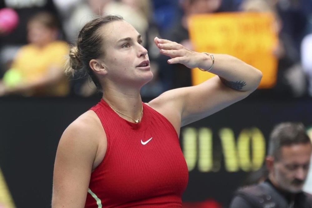 Aryna Sabalenka of Belarus celebrates after defeating Lesia Tsurenko of Ukraine in their third round match at the Australian Open tennis championships at Melbourne Park, Melbourne, Australia, Friday, Jan. 19, 2024. (AP Photo/Asanka Brendon Ratnayake)
