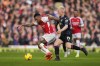 Arsenal's Gabriel Jesus, left, challenges for the ball with Crystal Palace's Will Hughes during the English Premier League soccer match between Arsenal and Crystal Palace at Emirates Stadium in London, Saturday, Jan. 20, 2024. (AP Photo/Kirsty Wigglesworth)