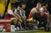 Inter Miami's Lionel Messi, center, speaks with his teammate Jordi Alba, as Luis Suarez, right, receives treatment on the bench during a friendly soccer match against El Salvador's national soccer team at the Cuscatlan stadium in San Salvador, El Salvador, Friday, Jan. 19, 2024. (AP Photo/Moises Castillo)
