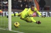 Bournemouth's goalkeeper Neto dives but fails to save the goal from Liverpool's Diogo Jota during the English Premier League soccer match between AFC Bournemouth and Liverpool at the Vitality Stadium, in Bournemouth, England, Sunday, Jan. 21, 2024. (AP Photo/Ian Walton)