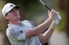Nick Dunlap watches his tee shot on the fourth hole of the Pete Dye Stadium Course during the final round of the American Express golf tournament, Sunday, Jan. 21, 2024, in La Quinta, Calif. (AP Photo/Ryan Sun)
