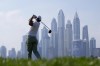 Rory McIlroy of Northern Ireland tees off on 8th hole during the final round of the Hero Dubai Desert Classic golf tournament, in Dubai, United Arab Emirates, Sunday, Jan. 21, 2024. (AP Photo/Kamran Jebreili)