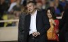 FILE - President of AS Monaco Dmitry Rybolovlev attends the French League One soccer match Monaco vs Bastia, in Monaco stadium,Wednesday, Sept, 25, 2013. Russian billionaire Dmitry Rybolovlev is exploring the possibility of selling his stakes in French soccer club Monaco. Rybolovlev has been the majority owner of Monaco since 2011. After Les Echos newspaper reported that the fertilizer magnate was open to selling the club and had mandated The Raine Group to work on a total or partial divestment project, a representative of Rybolovlev’s family office confirmed the move. (AP Photo/Lionel Cironneau, File)