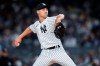 FILE - New York Yankees starting pitcher Luke Weaver works against the Arizona Diamondbacks during the first inning of a baseball game Friday, Sept. 22, 2023, in New York. Right-hander Luke Weaver is guaranteed $2 million as part of his one-year contract with the New York Yankees, a deal that includes a team option for 2025 and performance bonuses that allows him to earn up to $8.25 million over two seasons. As part of the deal announced Friday, Jan. 19, 2024, the Yankees hold a $2.5 million option for 2025.(AP Photo/Frank Franklin II, File)