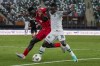 Nigeria's Moses Simon, right, duels for the ball with Guinea-Bissau's Nito Gomes during their African Cup of Nations Group A soccer match at the Felix Houphouet Boigny stadium in Abidjan, Ivory Coast, Monday, Jan. 22, 2024. (AP Photo/Themba Hadebe)
