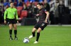 FILE - Portland Thorns FC forward Christine Sinclair (12) controls the ball during the first half of the NWSL championship soccer match against the Kansas City Current, Oct. 29, 2022, in Washington. Sinclair, the world’s top international goal scorer among both women and men, will play one more season for her club team, the Thorns. The team announced Monday, Jan. 22, 2024, it had signed the free agent forward to a one-year deal. (AP Photo/Nick Wass, File)