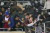 Spectators line a fence while trying to get a look of Inter Miami forward Lionel Messi as he leaves the field during the second half of a preseason friendly MLS soccer match against FC Dallas, Monday, Jan. 22, 2024, at the Cotton Bowl in Dallas. FC Dallas won 1-0. (AP Photo/Julio Cortez)