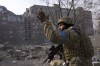 FILE - A Ukrainian serviceman guards his position in Mariupol, Ukraine, March 12, 2022. The image is part of the documentary 