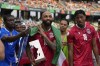 Equatorial Guinea's Emilio Nsue, center, celebrates with his man of the match awards after the African Cup of Nations Group A soccer match between Equatorial Guinea and Guinea Bissau, at the Alassane Ouattara Olympic stadium, in Abidjan, Ivory Coast, Thursday, Jan. 18, 2024. (AP Photo/Sunday Alamba)