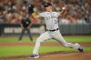 FILE - Colorado Rockies relief pitcher Brent Suter throws to the Baltimore Orioles during the eighth inning of a baseball game, Friday, Aug. 25, 2023, in Baltimore. Suter can earn $6.2 million over two seasons as part of his contract with the Cincinnati Reds, which guarantees $3 million to the 34-year-old left-hander. Suter has a $2.5 million salary and the deal, announced Jan. 13, includes a $3.5 million team option for 2025 with a $500,000 buyout.(AP Photo/Julio Cortez, File)