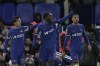 Chelsea's Axel Disasi, center, celebrates with teammates after scoring his sides third goal during the English League Cup semi final second leg soccer match between Chelsea and Middlesbrough at the Stamford Bridge stadium in London, England, Tuesday, Jan. 23, 2024. (AP Photo/Kin Cheung)