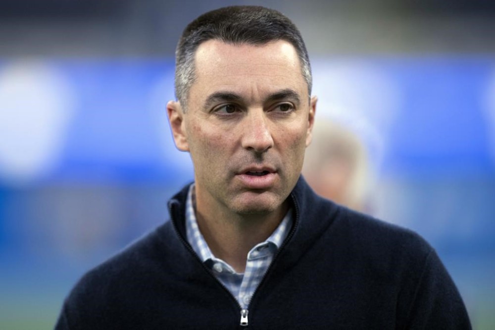 FILE - Los Angeles Chargers general manager Tom Telesco walks on the field before the team's NFL football game against the Kansas City Chiefs on Dec. 16, 2021, in Inglewood, Calif. The Las Vegas Raiders hired Telesco on Tuesday, Jan. 23, as their next general manager, passing over interim Champ Kelly for the position. (AP Photo/Kyusung Gong, File)