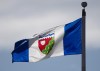 The Northwest Territories provincial flag flies on a flag pole in Ottawa on June 30, 2020. The Northwest Territories coroner's office is expected to provide an update this morning into a deadly plane crash near the town of Fort Smith. THE CANADIAN PRESS/Adrian Wyld