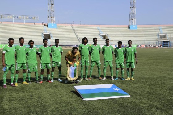 Hirshabele players pose for a team photo prior to the soccer league match between Jubaland at a stadium in Mogadishu, Somalia, Tuesday. (Farah Abdi Warsameh / The Associated Press)