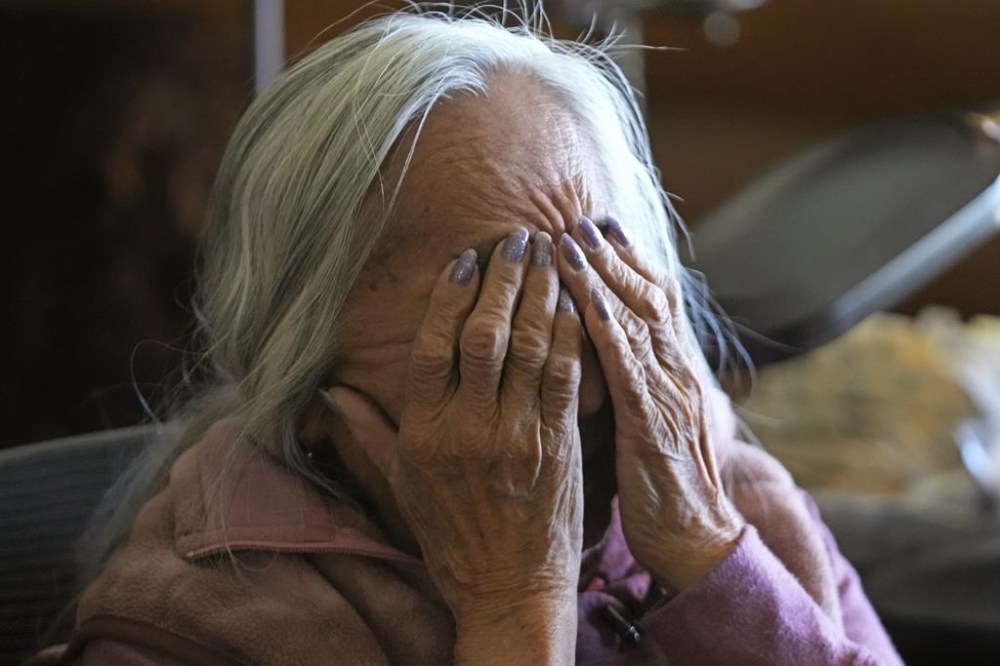 Delaine Spilsbury, a member of the Ely Shoshone tribe, gestures during an interview at her home on Nov. 12, 2023, near McGill, Nev. Spilsbury has worked for years on federal recognition for the sacred site, known as Bahsahwahbee, Shoshoni for “sacred water valley,” and hopes to soon see it named a national monument. (AP Photo/Rick Bowmer)