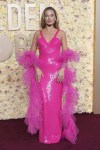 Margot Robbie arrives at the 81st Golden Globe Awards on Sunday, Jan. 7, 2024, at the Beverly Hilton in Beverly Hills, Calif. (Photo by Jordan Strauss/Invision/AP)