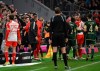 Union's head coach Nenad Bjelica is shown a red card during the German Bundesliga soccer match between Bayern Munich and Union Berlin at the Allianz Arena in Munich, Germany, Wednesday, Jan. 24, 2024. (Sven Hoppe/dpa via AP)