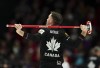 Brad Gushue's first appearance at a national curling championship was memorable for his team's unusual standings record and an interaction he won't forget. Gushue rests his broom over his shoulders after his delivery in the third end during the gold medal game against Scotland at the Men's World Curling Championship, in Ottawa, Sunday, April 9, 2023. THE CANADIAN PRESS/Sean Kilpatrick