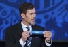 FILE - Zvonimir Boban, FIFA's Deputy Secretary General for Football, holds the lot of Chile during the draw for the soccer Confederations Cup 2017, in Kazan, Russia, on Nov. 26, 2016. Turmoil inside European soccer body UEFA fueled by its president Aleksander Ceferin’s push to change statutes to let him stay in office longer has led to a first exit of a senior manager. Zvonimir Boban cited his “total disapproval” for Ceferin’s political power move in resigning as UEFA Chief of Football. The former Croatia and AC Milan great was in the job for three years. Boban says he has “no option but to leave UEFA” and is 